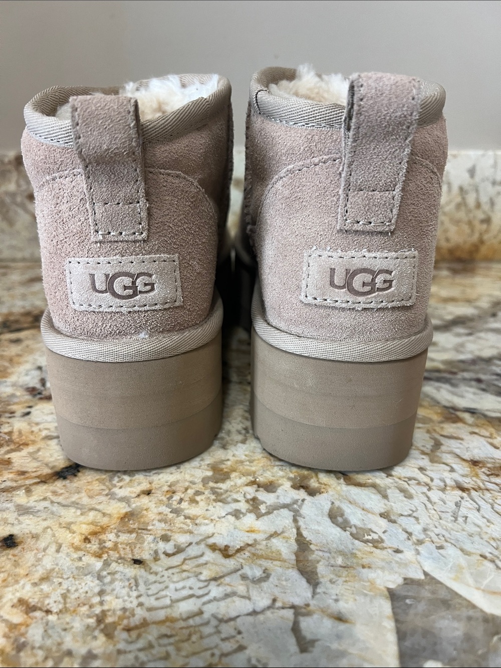 UGG women’s mini platform boot size 9